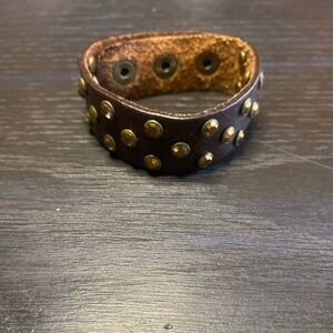 Brown faux leather adjustable cuff bracelet with gold rhinestones